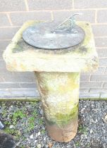 Large sandstone sun dial on plain rounded column. 84cm high, x 35cms wide.