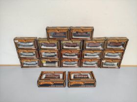 Mainline. Nineteen boxed 00 gauge freight rolling stock wagons and hoppers to include eleven Steel