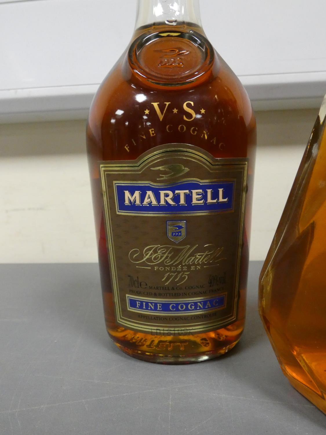 Two bottles of Martell V.S fine cognac, 70cl, 40% vol, with a glass decanter containing amber - Image 2 of 3