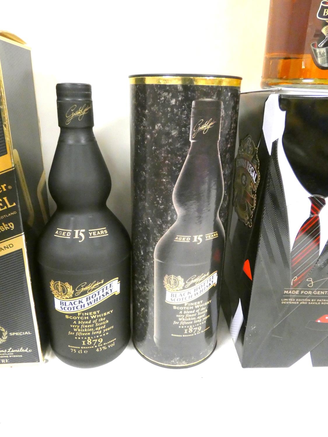 Four bottles of blended Scotch whisky to include BLACK BOTTLE 15 year old 43% abv. 75cl, JOHNNIE - Image 3 of 6