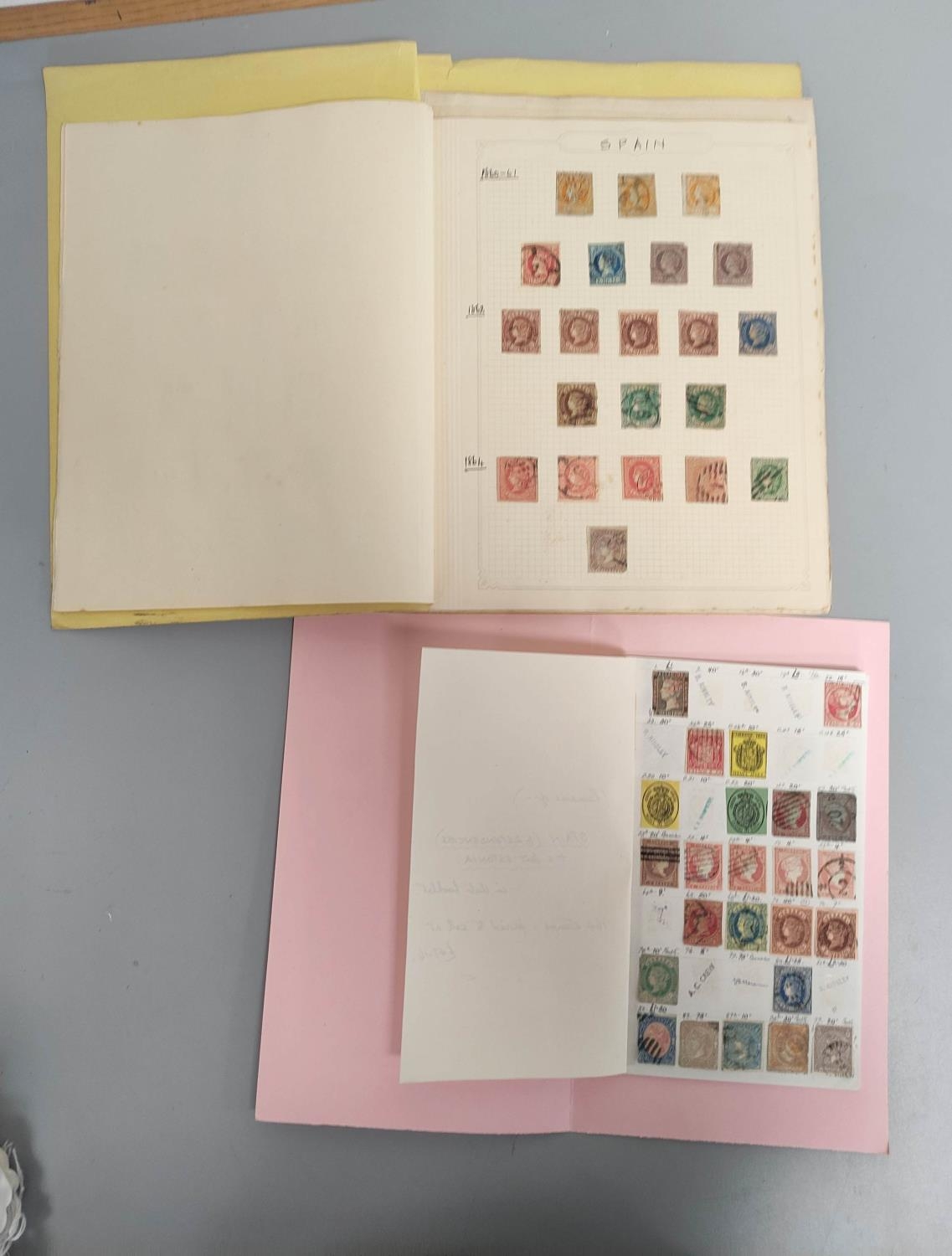 Two folders of early Spanish postage stamps many 1850s imperforated and later issues. To include