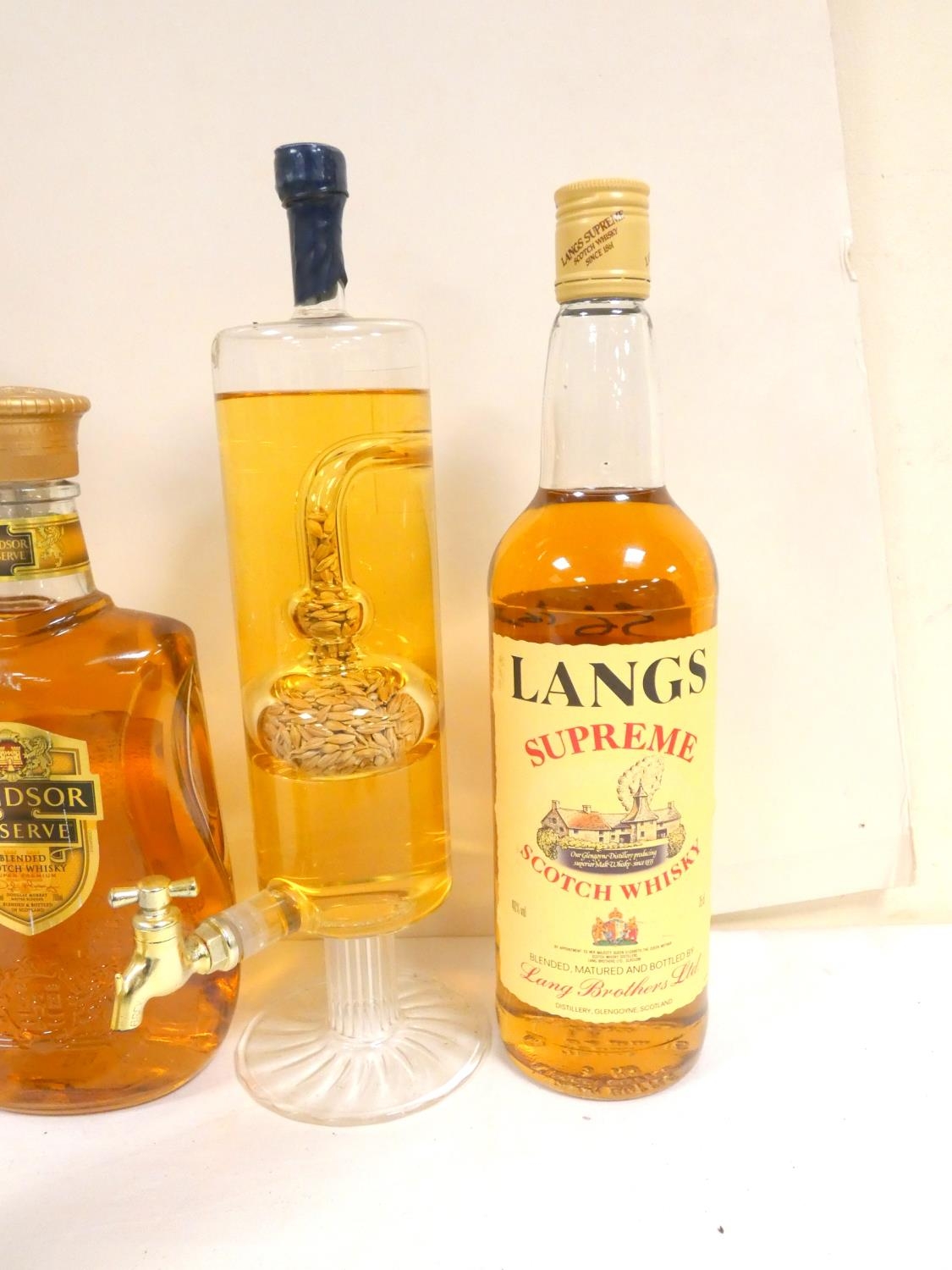 Four bottles of Scotch whisky to include three blends LANGS SUPREME 75cl 40% abv. THE CLAYMORE 40% - Image 3 of 4