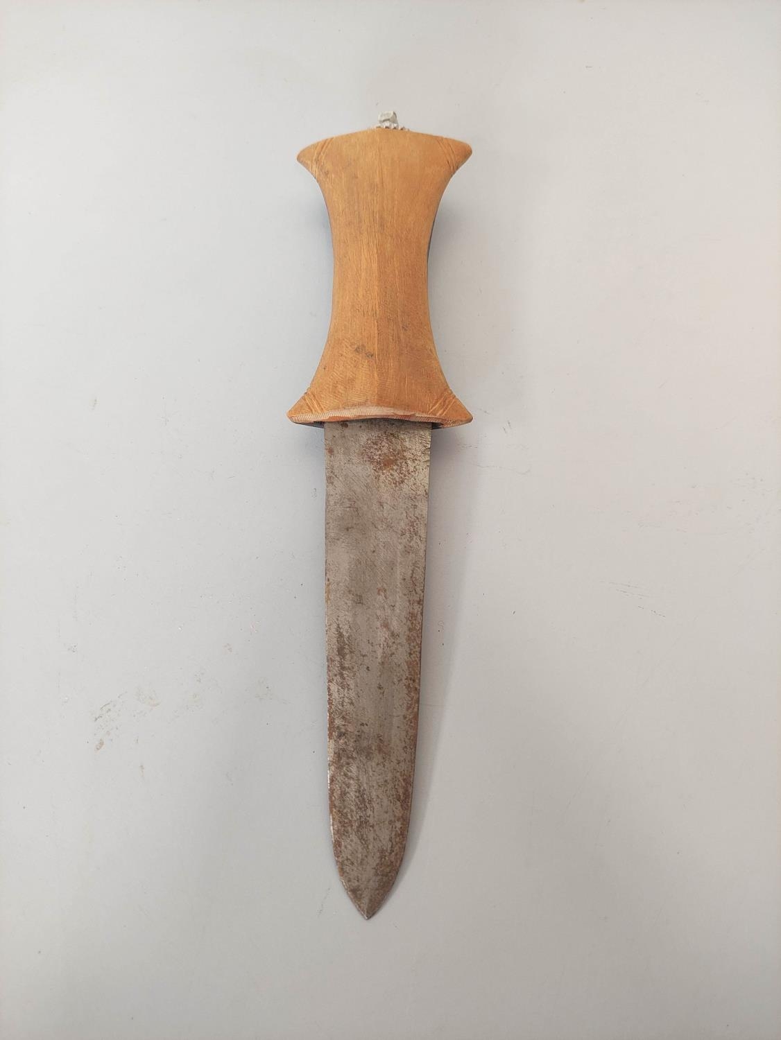 A Sudanese arm knife with tapering straight blade and carved wooden hilt. Contained in tooled - Image 2 of 6