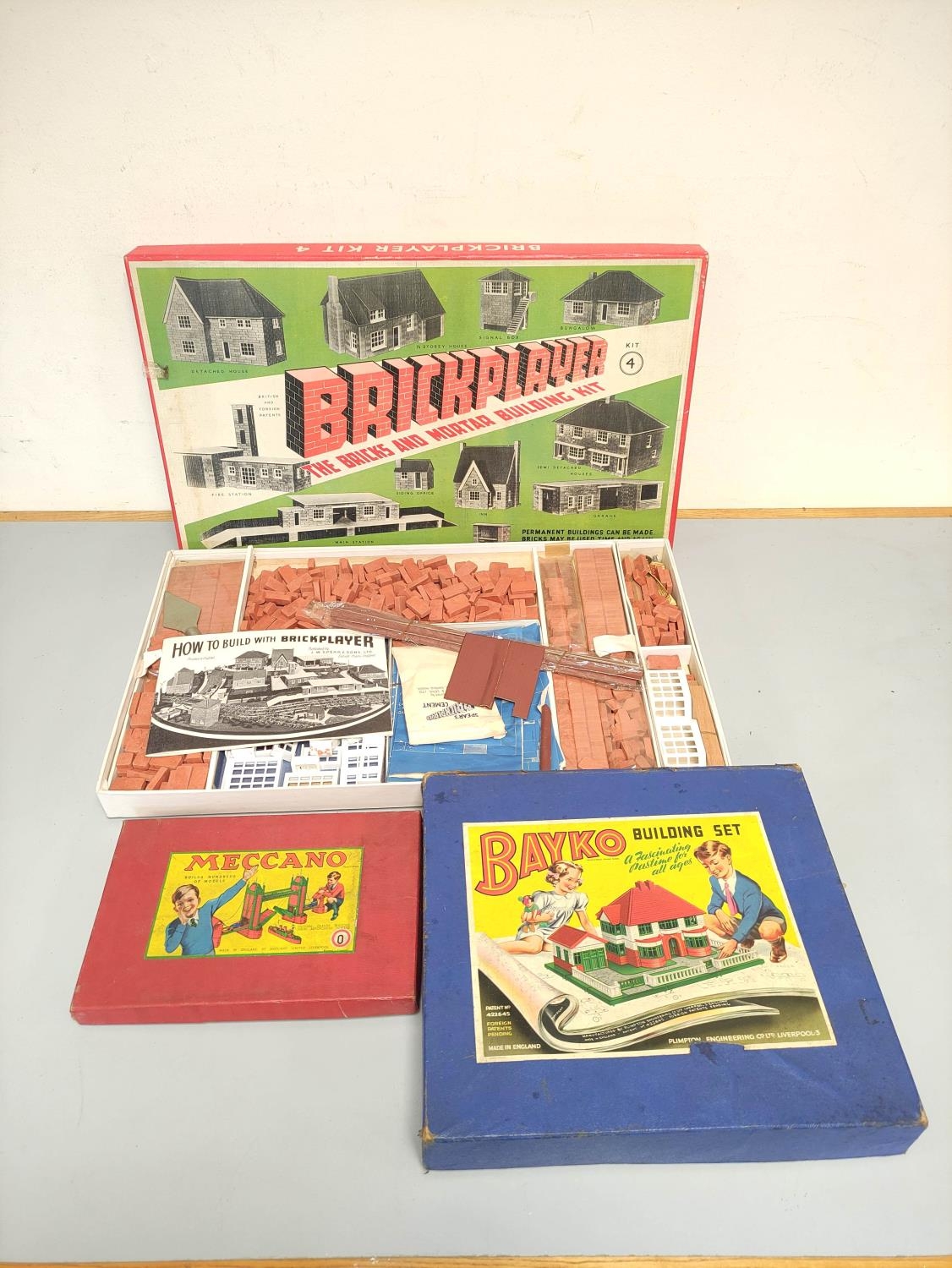 Vintage boxed construction sets to include Brickplayer Kit 4, Bayko Building Set, and Meccano outfit