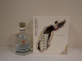 Two bottles of gin to include ISLE OF RAASAY gift set with two tasting glasses 46% abv. 70cl boxed