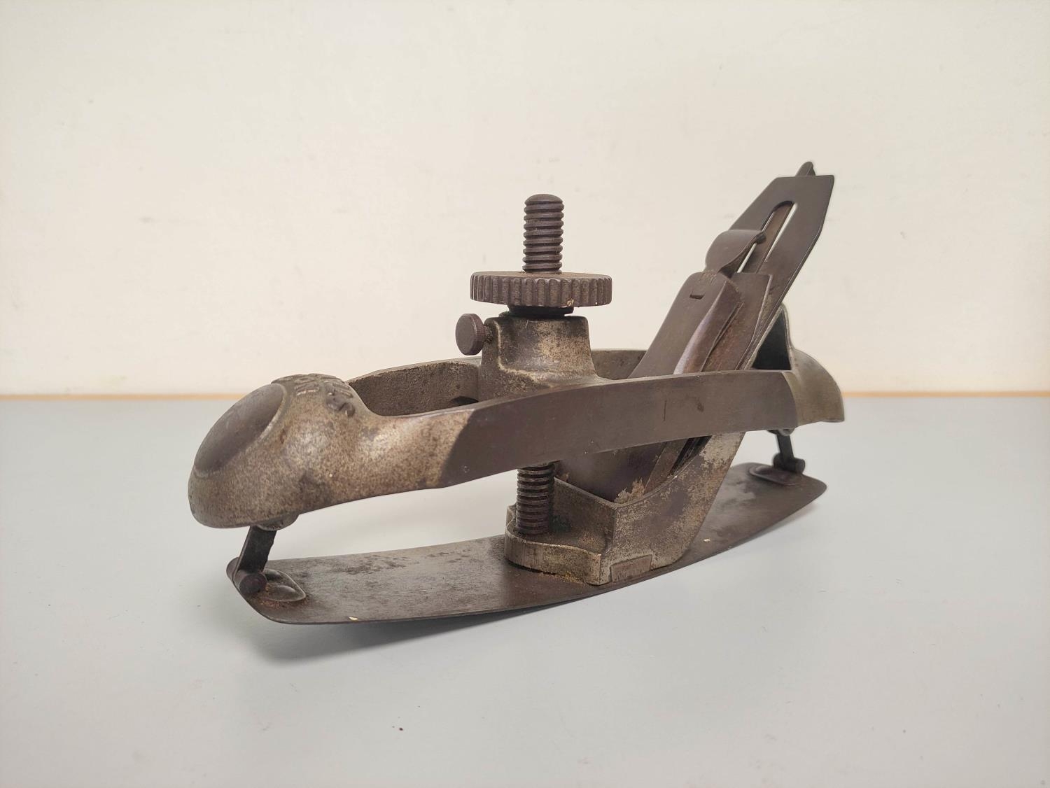 A fine early 20th century Stanley No.20 compass/contour woodworking plane.