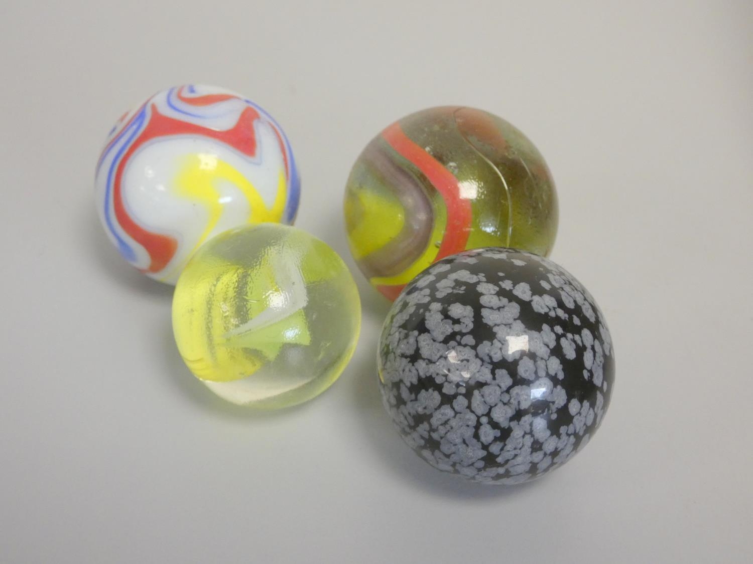 A large collection of vintage marbles to include Jacks and hand blown examples. - Image 2 of 2