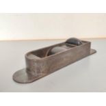 1820s iron mitre plane with ebony infill and wedge. Length 28cm