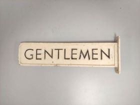 Railway station cast aluminium double sided black and white painted sign ''Gentlemen''. 34cm x 8cm