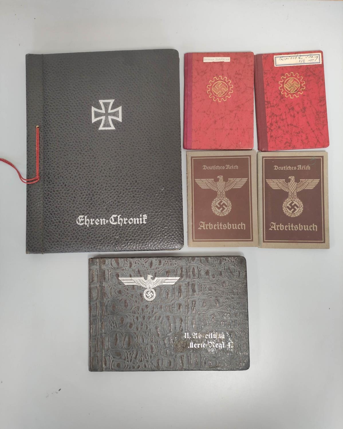 German Third Reich collectables to include an Ehren Chronik (honour chronicle), a postcard album,