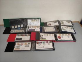 Box containing a large quantity of presentation packs and first day covers dating from the 1960s-