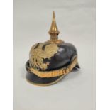 Imperial German Pickelhaube spiked officer's helmet model 1897. The helmet of black leather