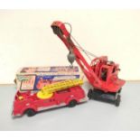 Triang. Vintage tinplate KL 44 model Jones Mobile Crane. Red body, with black base and litho-printed