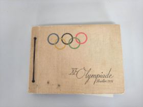 1930s German photograph collection housed within a Berlin 1936 Olympics album folder. The first