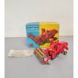 Corgi Toys. No. 1111 Massey Ferguson 780 Combine Harvester. Contained in original box, with two