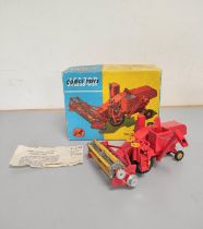 Corgi Toys. No. 1111 Massey Ferguson 780 Combine Harvester. Contained in original box, with two
