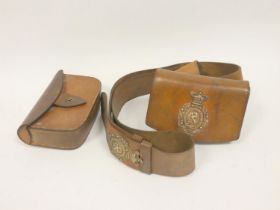 Victorian military leather belt with two cartridge pouches one bearing a silver plaque for the