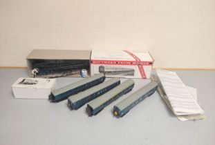Southern Pride Models. 4mm 00 gauge BR822 4-TC construction kit along with four passenger coaches.