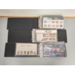 Three albums of c2010s British mint presentation packs postage stamp sets comprising of 195 first