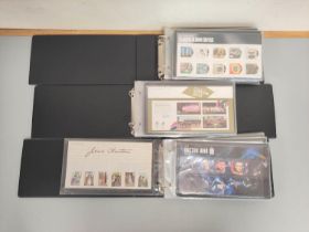 Three albums of c2010s British mint presentation packs postage stamp sets comprising of 195 first