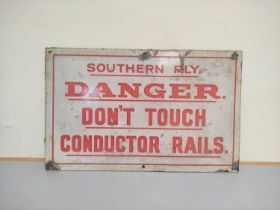 Southern Railway enamel sign, red lettering on a white ground, inscribed ''Southern Railway Don't