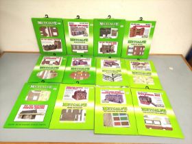 Thirteen sealed Metcalfe Card Construction & Material Kits. OO, N and HO scale buildings to