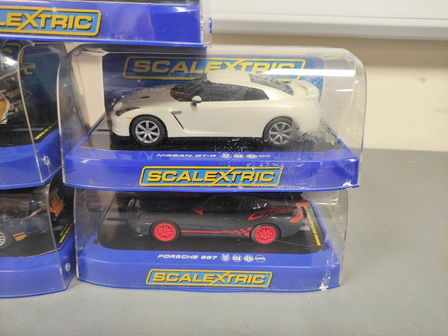 Scalextric. Five 1/32 scale racing car models in perspex cases to include Porsche 997 C3079, - Image 4 of 6