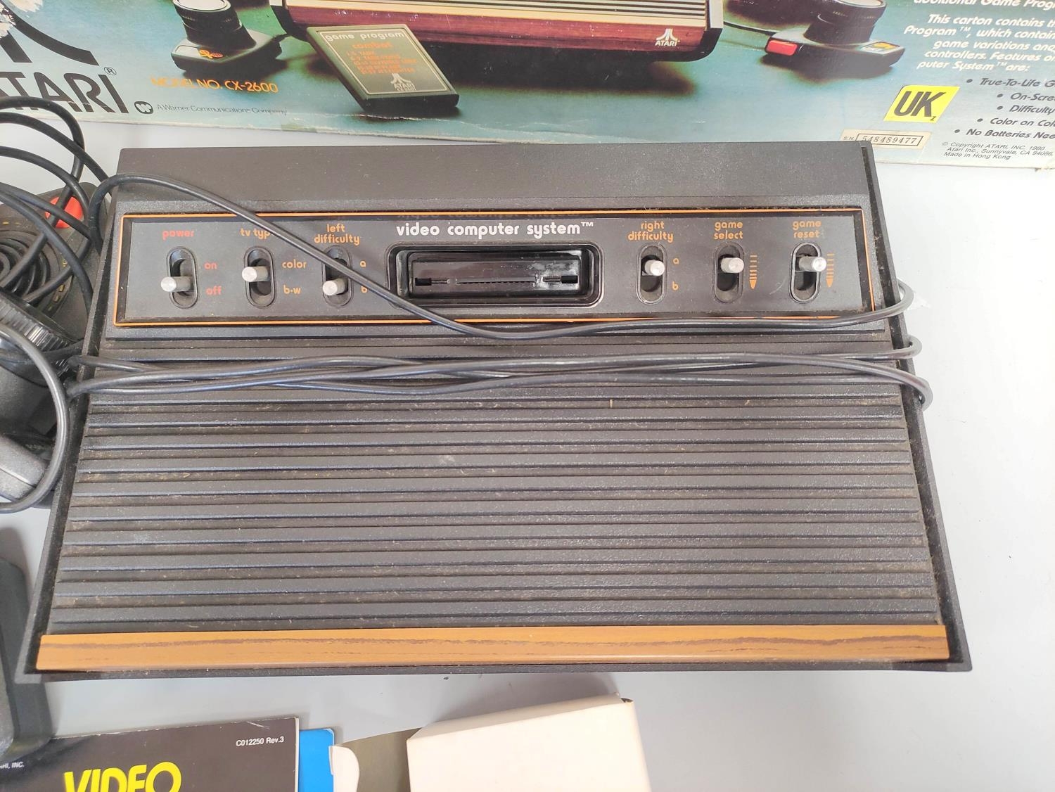 Boxed Atari video computer system, model CX-2600A with accessories and games to include Missile - Image 3 of 6