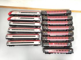 Hornby Railways. Virgin Trains engines and rolling stock comprising of a Virgin Star 4 Car EMU