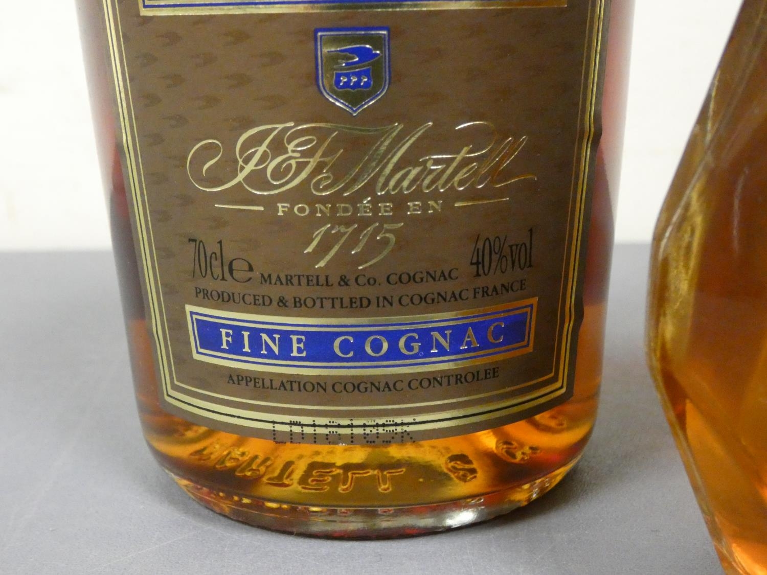 Two bottles of Martell V.S fine cognac, 70cl, 40% vol, with a glass decanter containing amber - Image 3 of 3