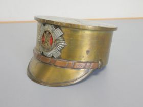 A large First World War trench art Officer's copper and brass cap made from a 1918 4.5" Howitzer