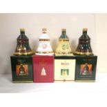 Four bottles of BELLS blended Scotch whisky to include Christmas 1992, 1993, 1998 and 2000, each 40%