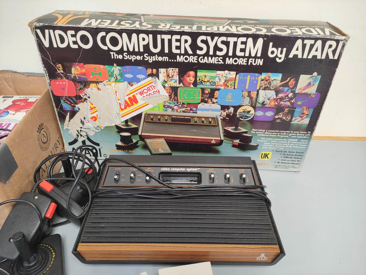 Boxed Atari video computer system, model CX-2600A with accessories and games to include Missile - Image 2 of 6