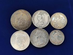 Collection of British and World silver coins to include a 1922 USA dollar, an 1868 French 5F, 1889