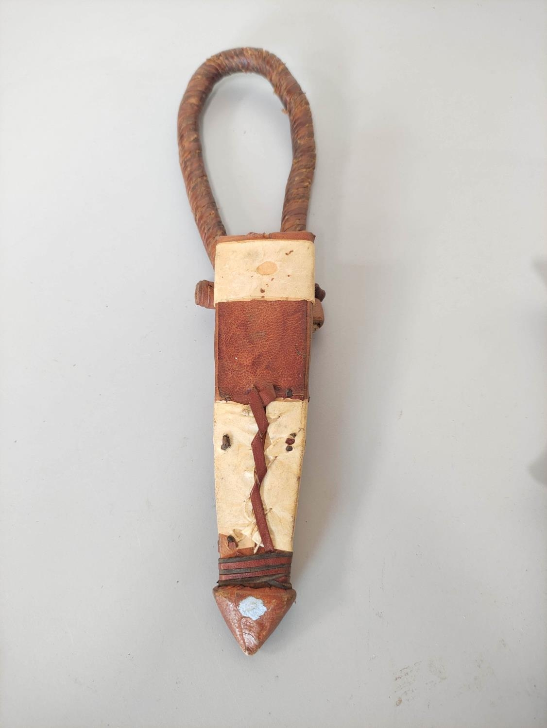 A Sudanese arm knife with tapering straight blade and carved wooden hilt. Contained in tooled - Image 5 of 6