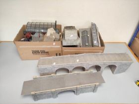 Three boxes of model railway buildings and track components to include a church, terraced houses,