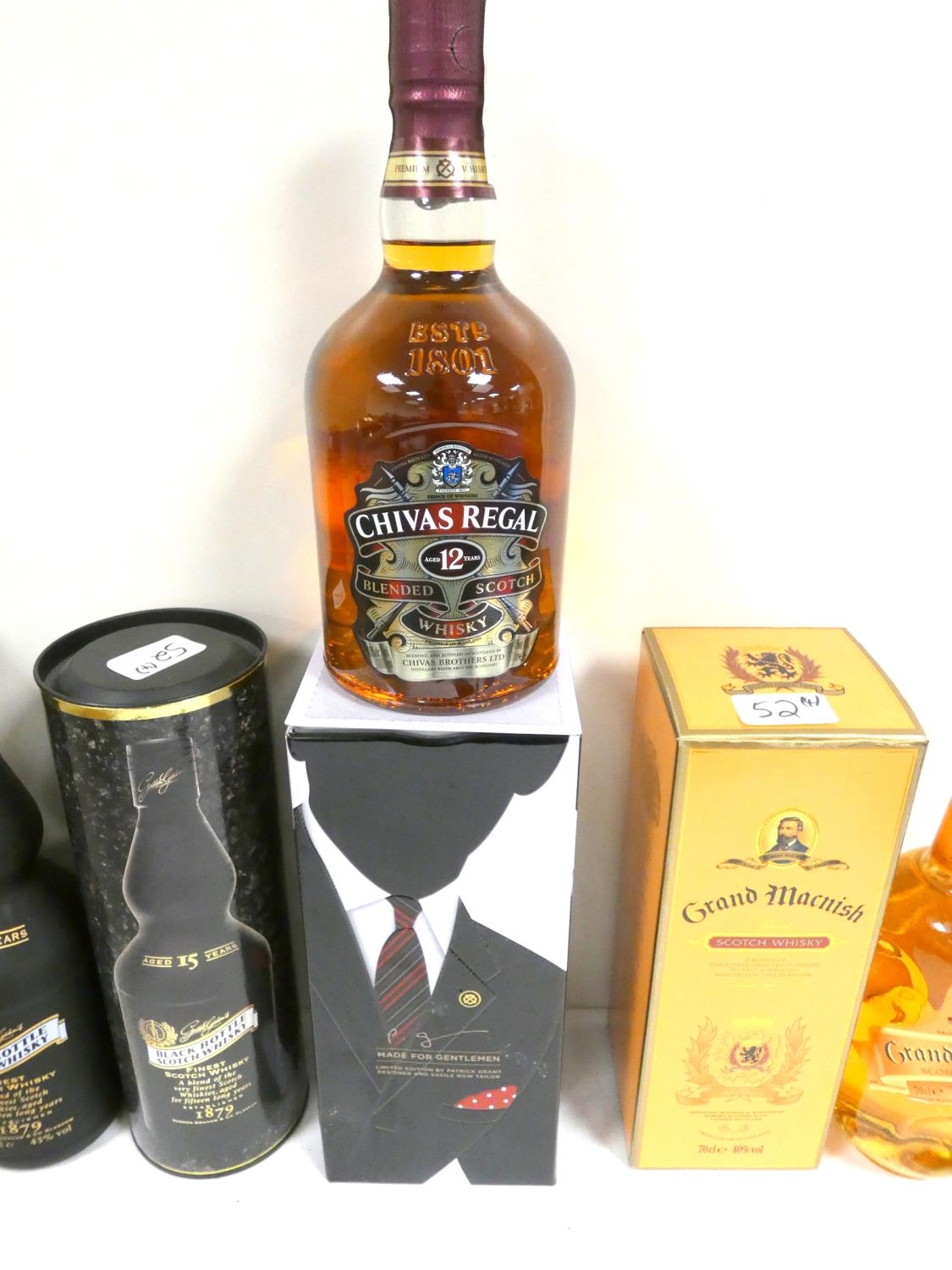 Four bottles of blended Scotch whisky to include BLACK BOTTLE 15 year old 43% abv. 75cl, JOHNNIE - Image 4 of 6