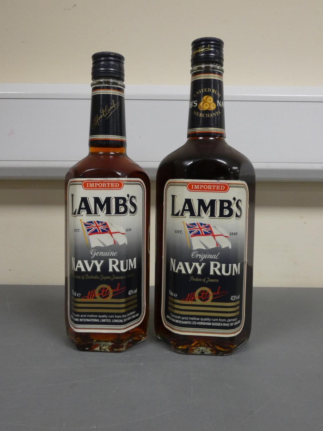 Two Imported bottles of Lamb's Navy Rum, Bottled circa 1980s, Imported by United rum merchants