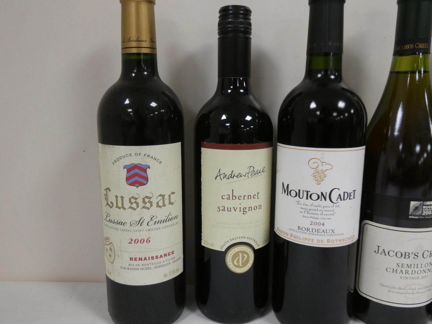 Seven bottles of wine to include LUSSAC 2006 12.5% abv. MOUTON CADET 2004 12.5% abv. CASTILLO DE - Image 2 of 4