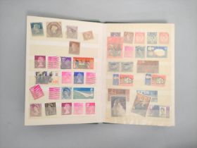 Album of British and World stamps to include a GB 1854 embossed six pence stamp.