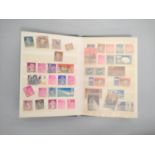 Album of British and World stamps to include a GB 1854 embossed six pence stamp.