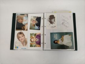 A well filled celebrity autograph album with examples from Chris De Burg, Philip Scofield, Leslie