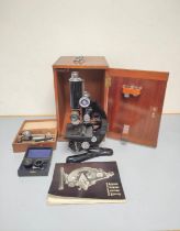 Beck London model 47 monocular microscope serial no. 25089, in black enamel finish, in mahogany