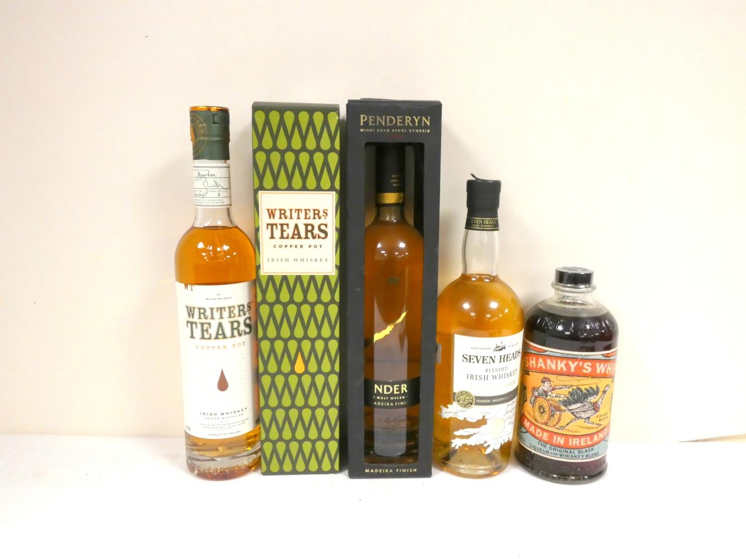 Four bottles of whisky to include PENDERYN Madeira Finish Welsh single malt whisky 46% abv. 70cl