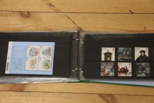 Green ring binder album of GB mint stamps including miniature sheets, estimate FV~£280.
