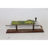 Golfing interest, a desk top paperweight model of a 1850s style hickory shafted long nose wood after