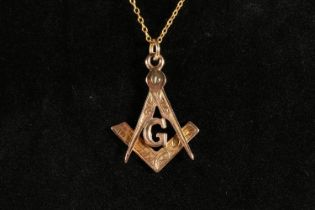 9ct gold Masonic pendant in the form of a crossed compass and square with 'G' in the centre, by