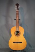 Antonio Sanchez six string acoustic guitar in soft case.