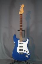 Rockson six string electric guitar in navy blue and white body in hard fitted case.