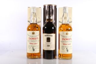 Two bottles of DEWAR'S WHITE LABEL blended Scotch whisky 75cl 43.5% abv. boxed and a bottle of